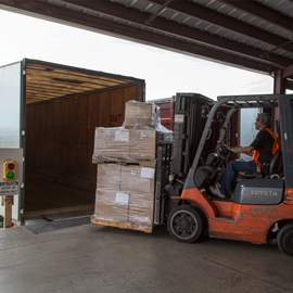 Loading goods on truck at US cross dock