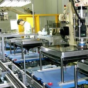 There is a state of the art factory with automized machines helping to facilitate the manufacturing process.