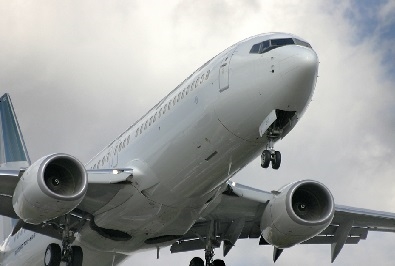 A picture of a large business aircraft taking off in the Mexican sky.