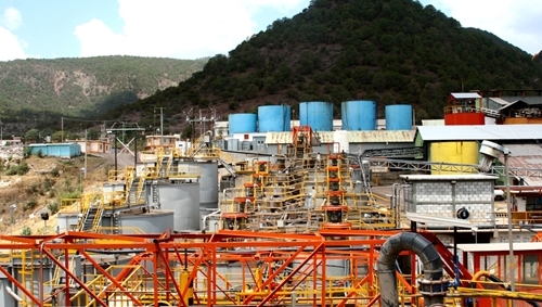 Manufacturing community being build in front of a lush green mountain in Mexico.