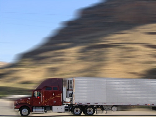 A large truck transporting manufactured goods, such as medical devices, from Mexico to the U.S.